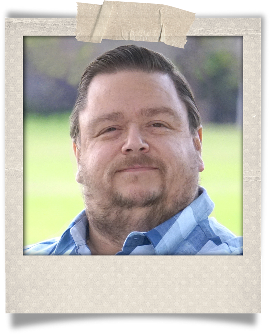 John in a polaroid picture frame.